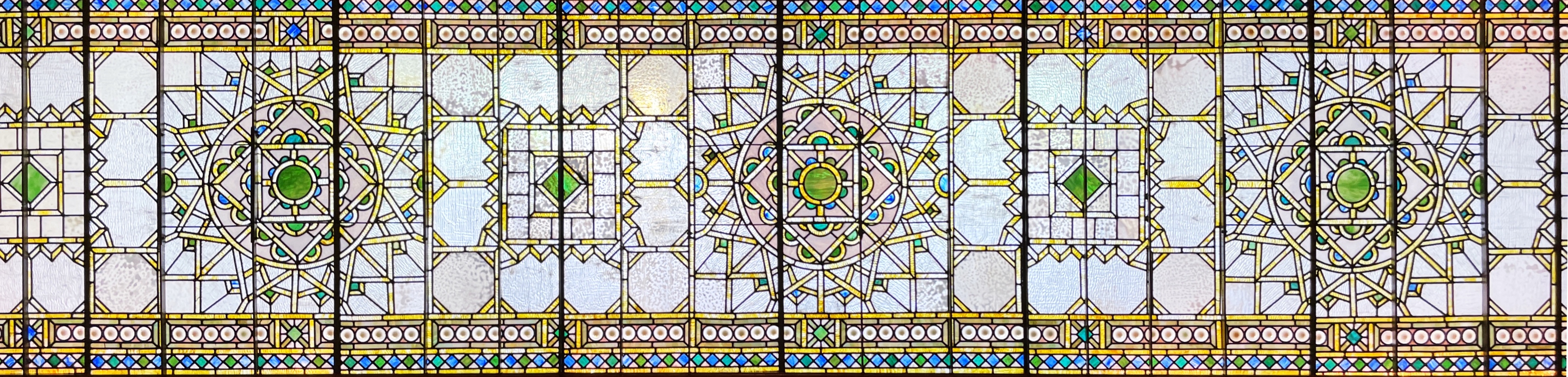 Detail of glasswork within Ayer mansion stairwell.