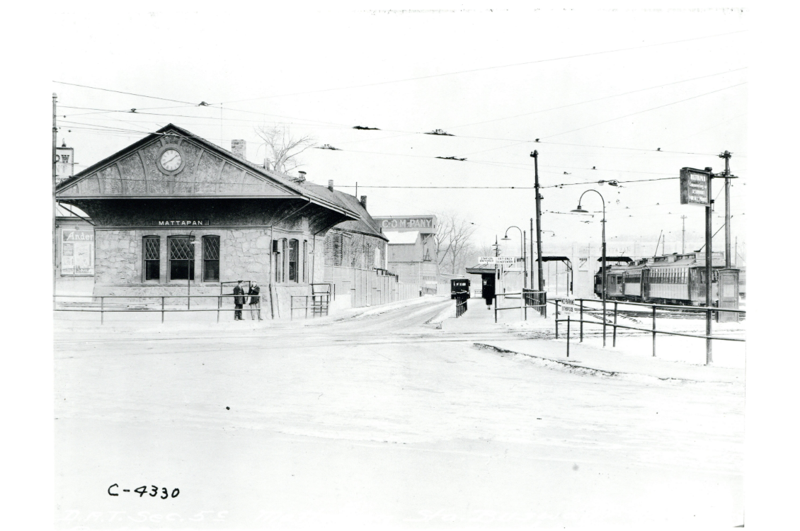 black and white image of train station from 20th century 